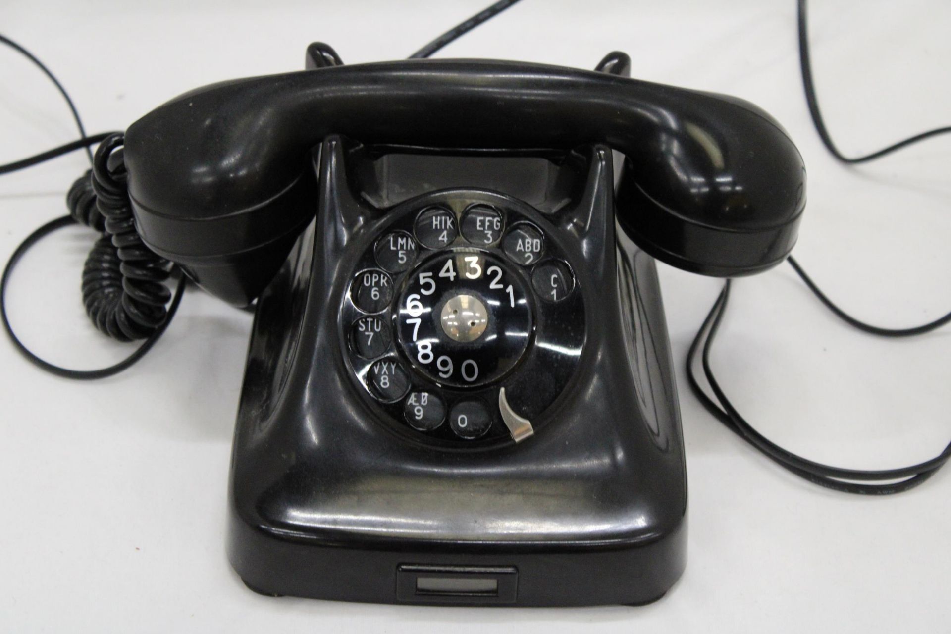 A VERY HEAVY VINTAGE TERRESTIAL TELEPHONE