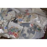 A LARGE QUANTITY OF USED STAMPS ON ENVELOPES AND STAMPS TO INCLUDE SPAIN, CANADA, MALTA, ETC.,