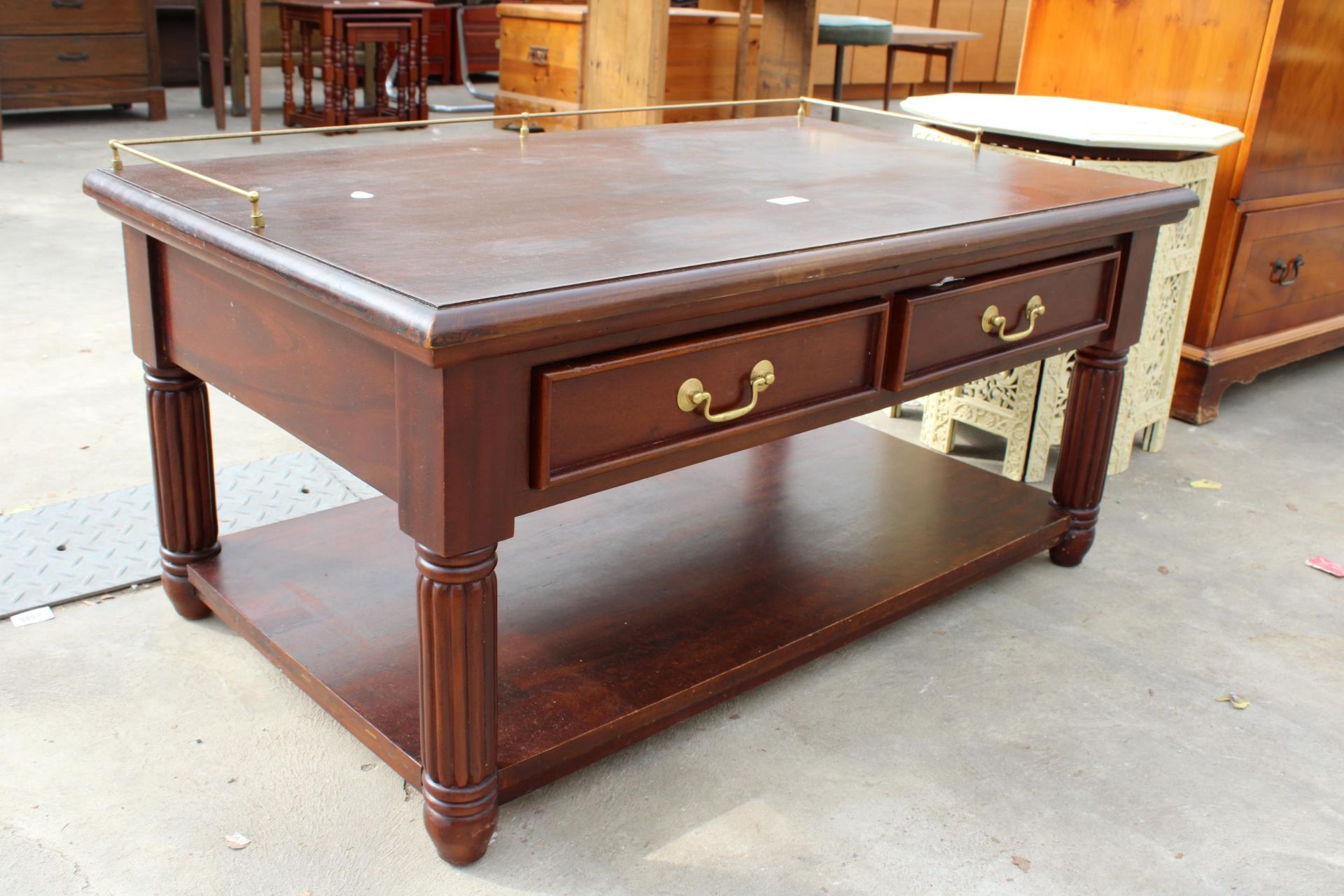 A MODERN HARDWOOD LOW SIDE TABLE WITH TWO DRAWERS AND BRASS GALLERY, 39" WIDE - Image 2 of 4