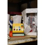 THREE BOXED DOLLS AND A FISHER-PRICE CASH REGISTER
