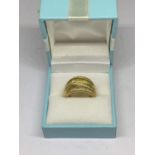 A BOXED SILVER GILT RING