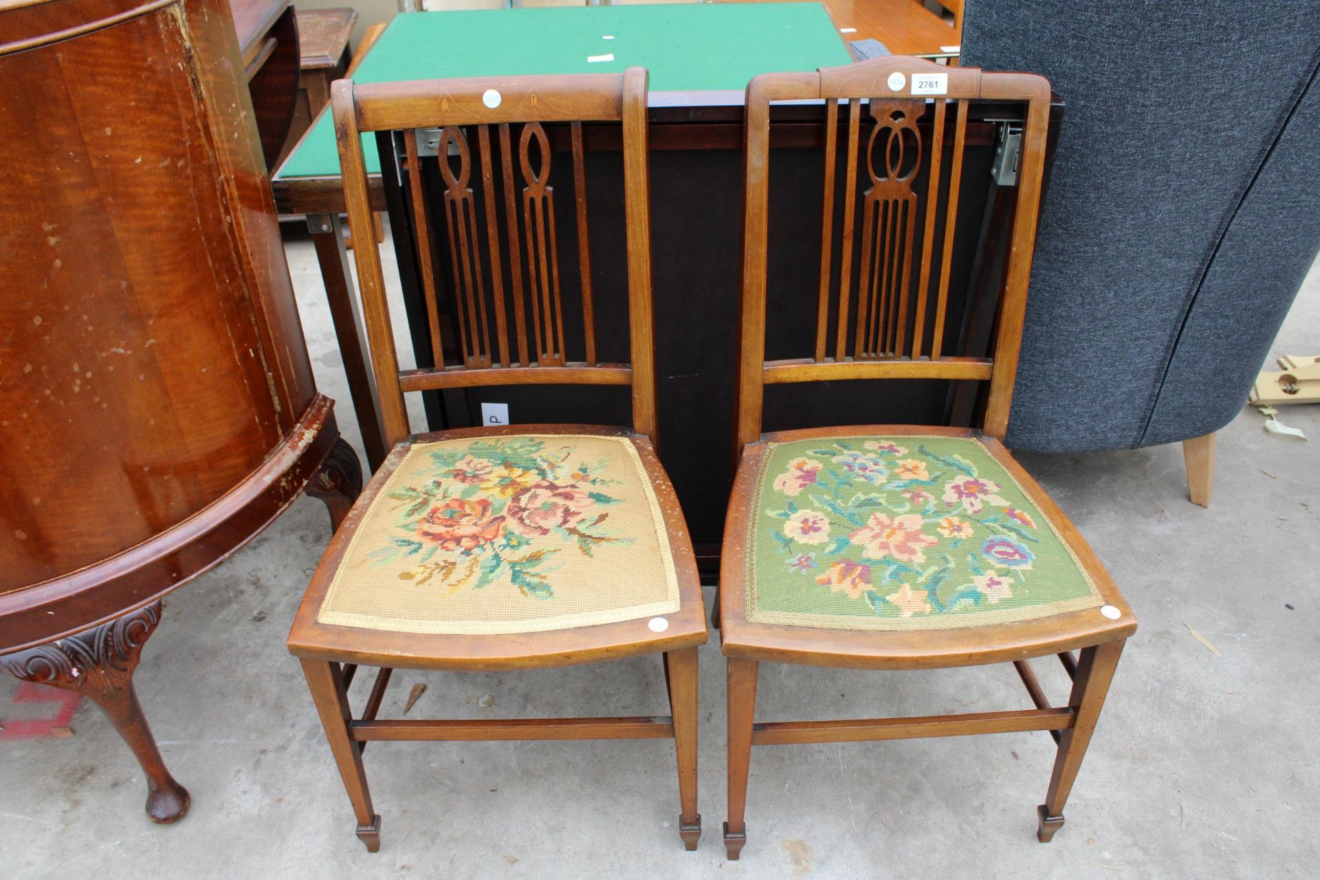 A PAIR OF EDWARDIAN MAHOGANY AND INLAID BEDROOM CHAIRS WITH WOOLWORK SEATS