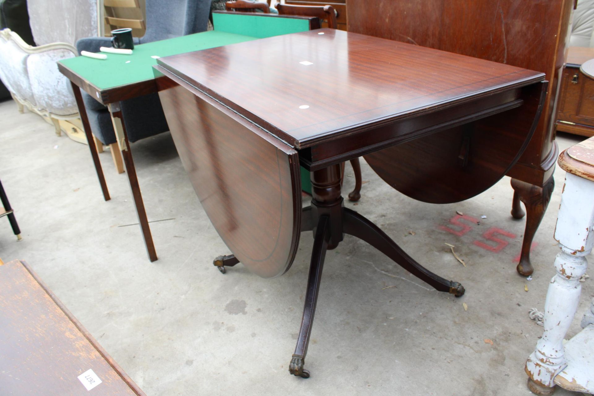 A REGENCY STYLE MAHOGANY DROP-LEAF PEDESTAL DINING TABLE, 61" X 36" OPENED - Image 2 of 3