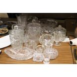 A LARGE QUANTITY OF GLASSWARE TO INCLUDE BOWLS, JUGS, LIDDED CONTAINERS, ETC