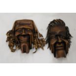 TWO VINTAGE SHAMAN ART STYLE LEATHER WALL MASKS