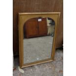 A MODERN GILT COLOURED WALL MIRROR 29" X 21"