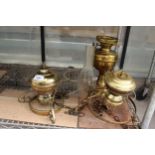 A VINTAGE BRASS OIL LAMP CONVERTED TO ELECTRIC AND TWO BRASS CEILING LIGHTS