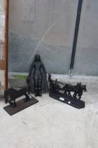 TWO CAST IRON HORSE DOOR STOPS AND A CAST IRON MALE FIGURE