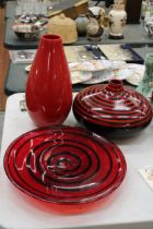 A STRIKING RED AND BLACK STRIPED VASE, RED AND BLACK LARGE GLASS DISH AND A LARGE RED VASE