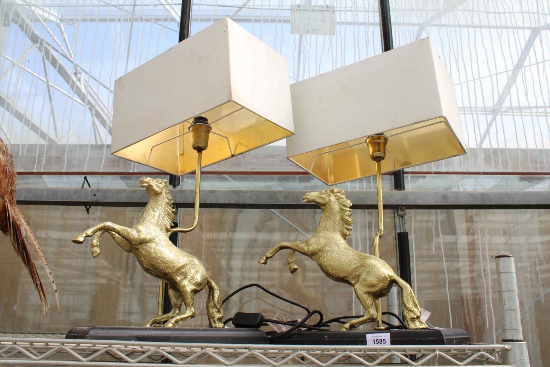 A PAIR OF DECORATIVE TABLE LAMPS WITH BRASS HORSE FIGURE DECORATION
