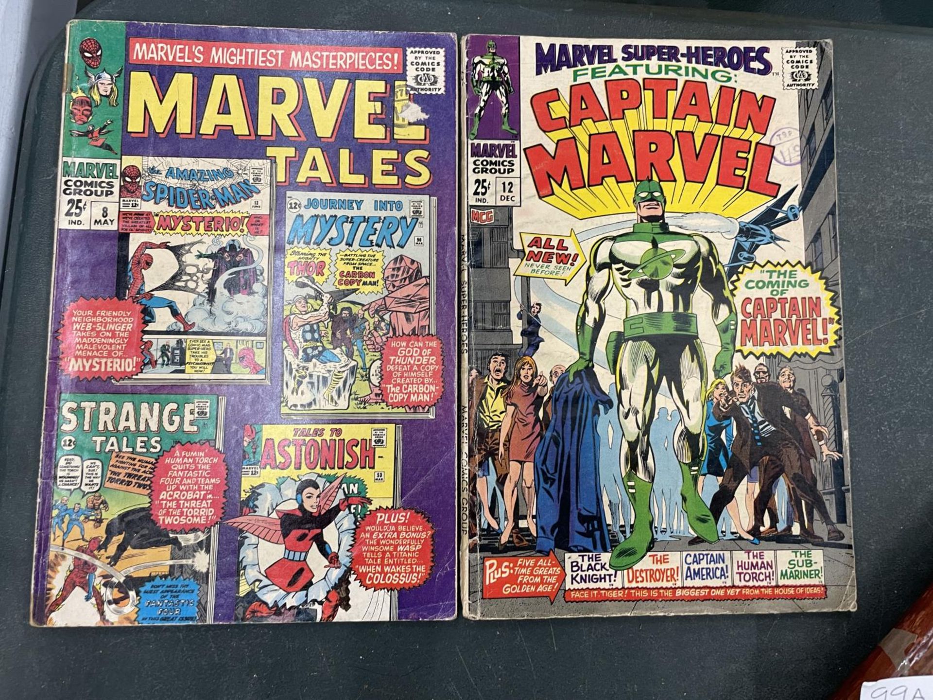 TWO VINTAGE CAPTAIN MARVEL COMICS TO INCLUDE A MARVEL TALES