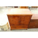 A YEW WOOD TELEVISION CABINET, 35" WIDE