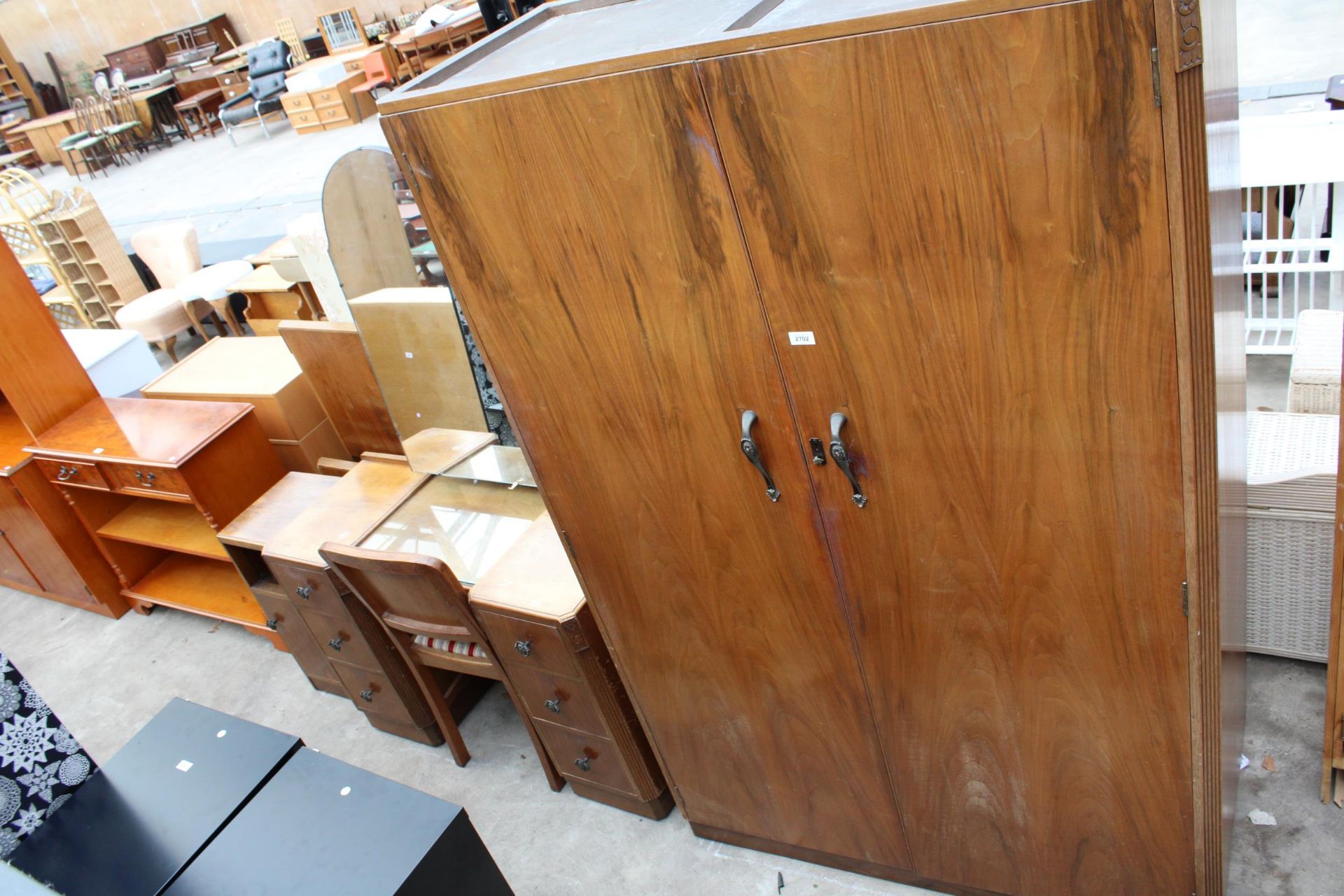 A MID 20TH CENTURY D.B.S. FURNITURE WALNUT TWO DOOR WARDROBE, DRESSING TABLE, 4'6" BEDHEAD AND FOOT,