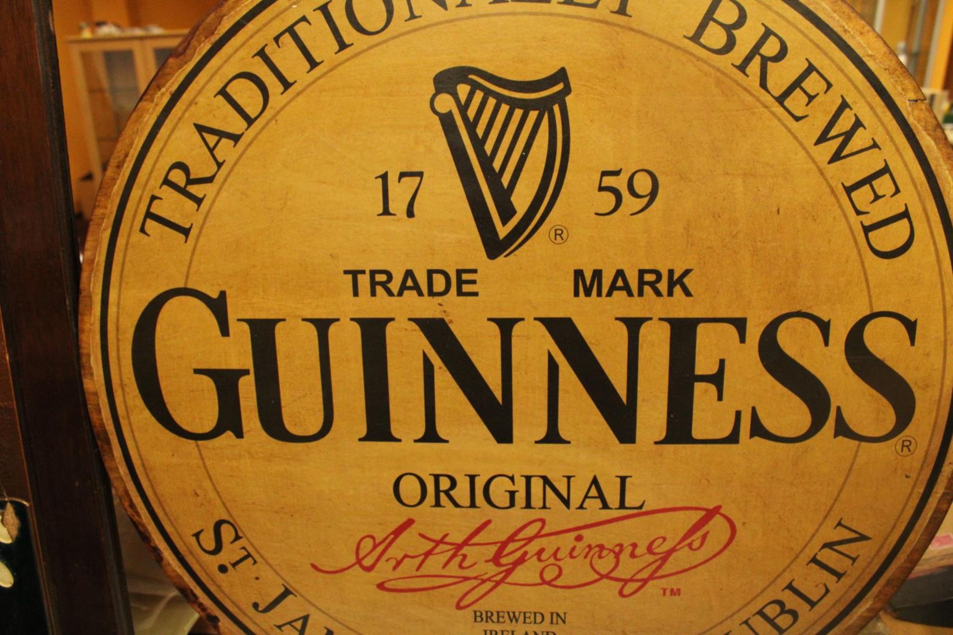 A LARGE WOODEN CIRCULAR GUINESS ADVERTISING SIGN 24" DIAMETER - Image 2 of 4