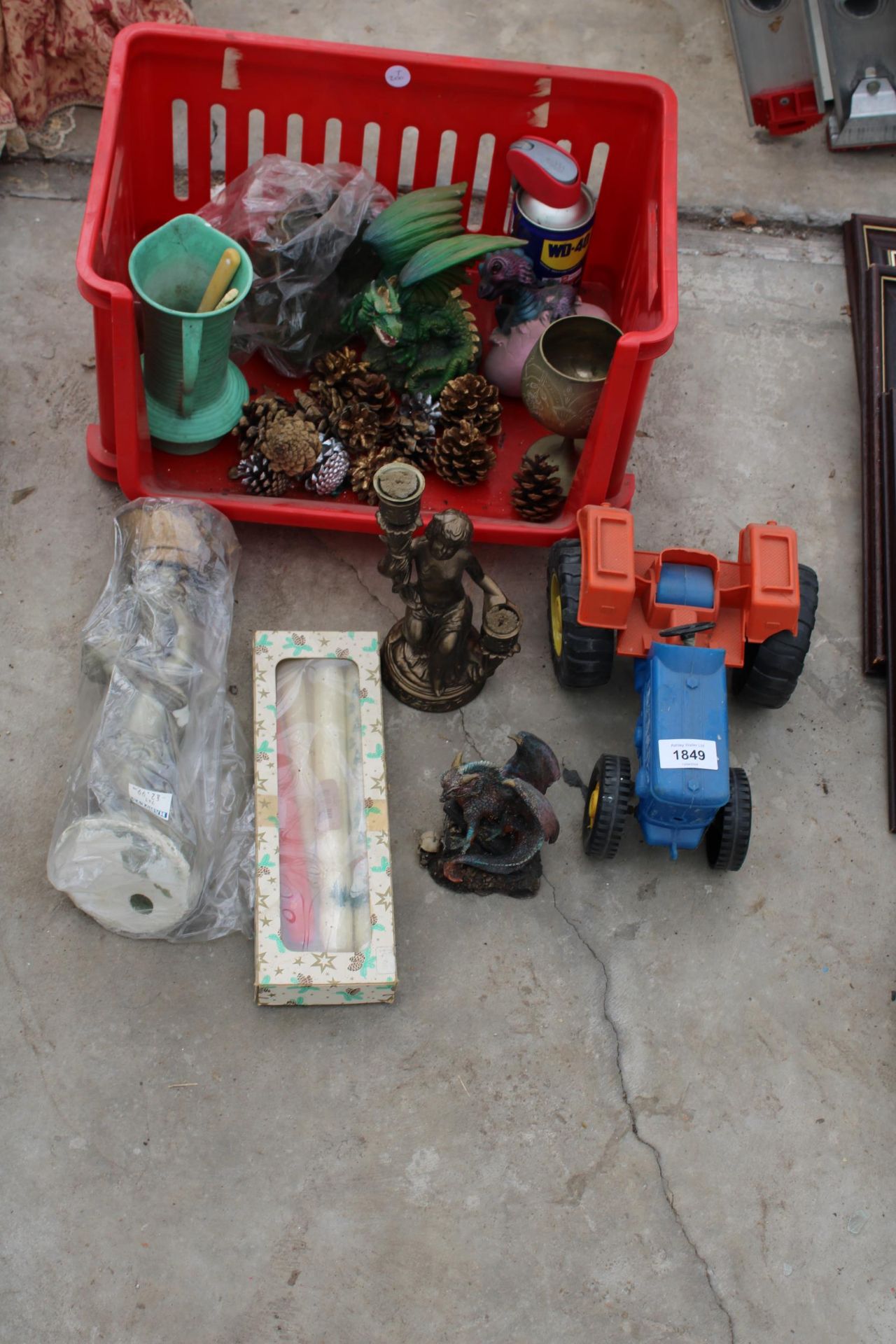 AN ASSORTMENT OF ITEMS TO INCLUDE A TRACTOR, A BRASS GOBLET AND DRAGON FIGURES