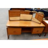 A RETRO TEAK TWIN PEDESTAL DRESSING TABLE ENCLOSING FOUR DRAWERS WITH TRIPLE MIRROR 61" WIDE