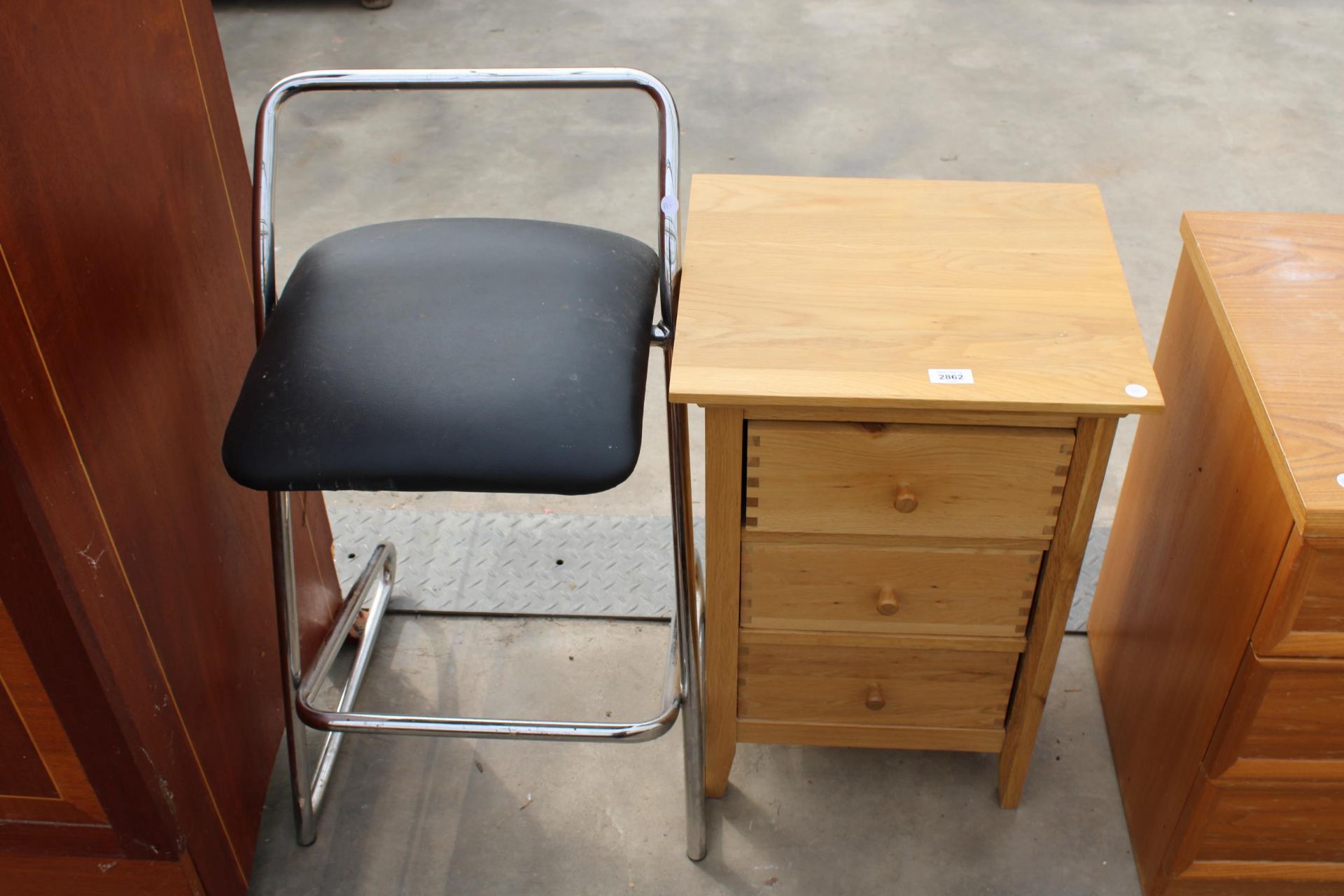 A MODERN OAK WILLIS AND GAMBIER BEDSIDE CHEST AND TUBULAR FRAMED STOOL