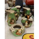 FIVE WITHENSEA AND HORNSEA POTTERY FAUNA VASES