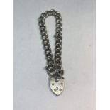 A MARKED SILVER WRIST CHAIN WITH SILVER HEART CLASP