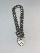 A MARKED SILVER WRIST CHAIN WITH SILVER HEART CLASP