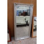 A MODERN SILVER GILT BEVEL EDGE WALL MIRROR, 62.5" X 30"