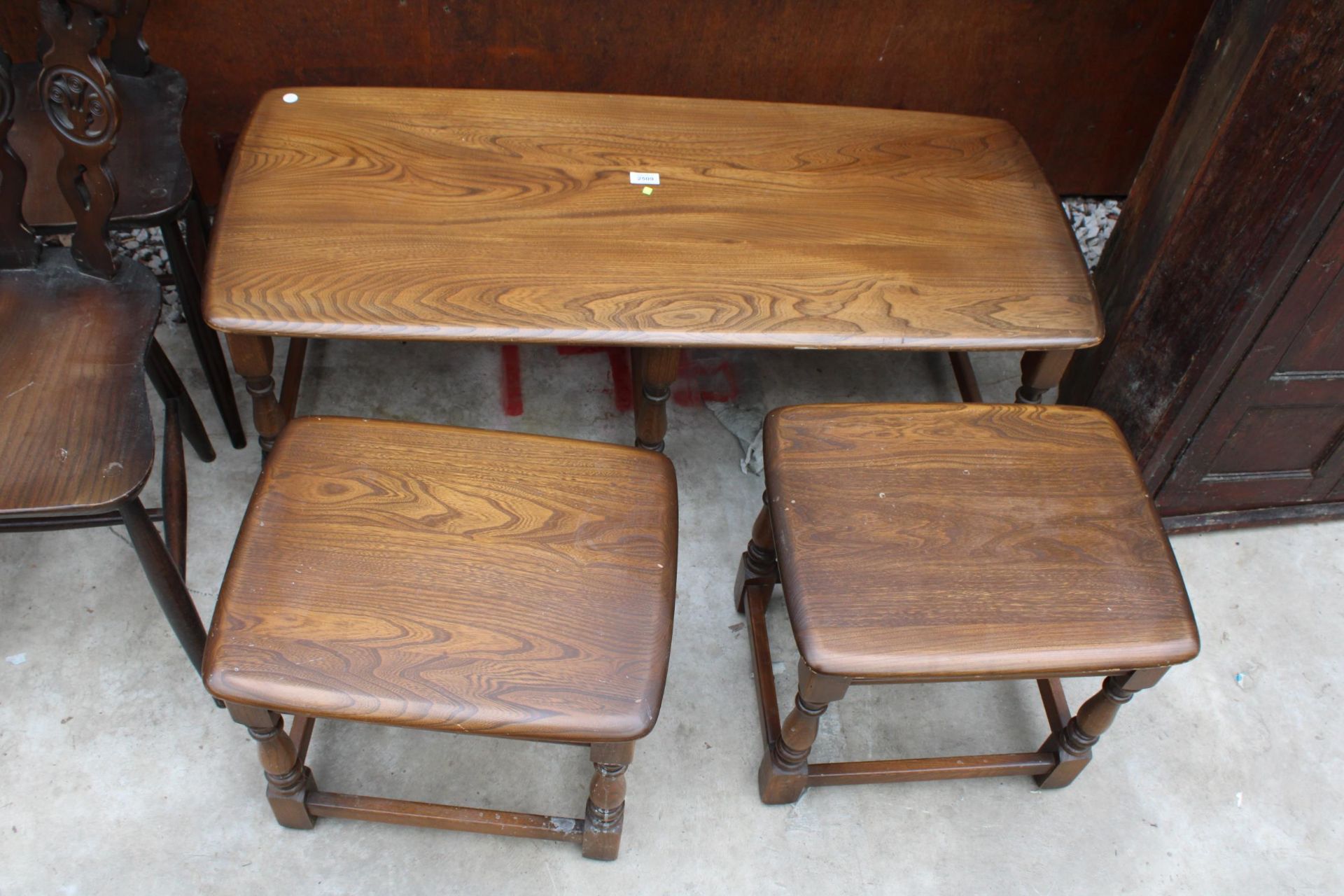 AN ERCOL BLONDE NEST OF THREE TABLES - Image 2 of 2