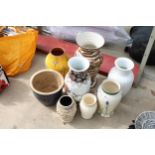 AN ASSORTMENT OF GLAZED AND CERAMIC VASES AND PLANTERS ETC