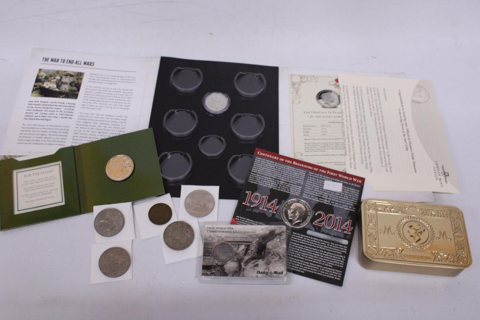 A COLLECTION OF WORLD WAR I COINS TO INCLUDE A CENTENARY OF THE BEGGINING OF THE FIRST WORLD WAR £
