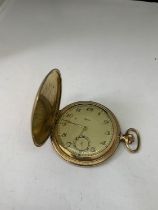 A GERMAN GOLD PLATED POCKET WATCH SEEN WORKING BUT NO WARRANTY