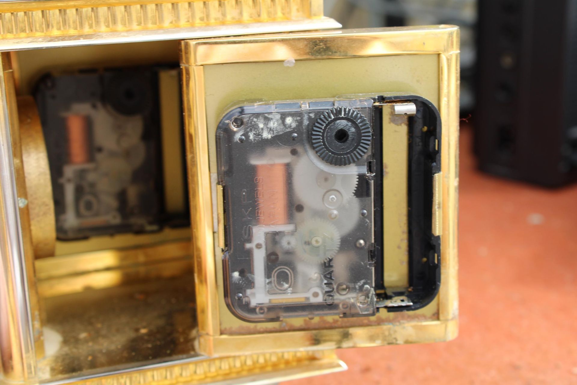 A BRASS JENS OLSEN REVOLVING DESK CLOCK WITH FOUR FACES, TWO BEING CLOCKS, ONE THERMOMETER AND ONE - Image 6 of 6