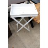 A MODERN PAINTED BUTLERS TRAY ON FOLDING STAND