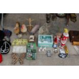 A LARGE ASSORTMENT OF ITEMS TO INCLUDE BIRD FEEDERS, GNOMES AND AN EGG CROCK BASKET ETC