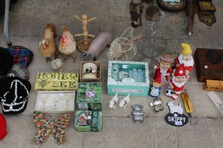 A LARGE ASSORTMENT OF ITEMS TO INCLUDE BIRD FEEDERS, GNOMES AND AN EGG CROCK BASKET ETC