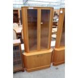 A RETRO TEAK TURNIDGE OF LONDON CORNER UNIT, 35" WIDE WITH GLAZED UPPER PORTION