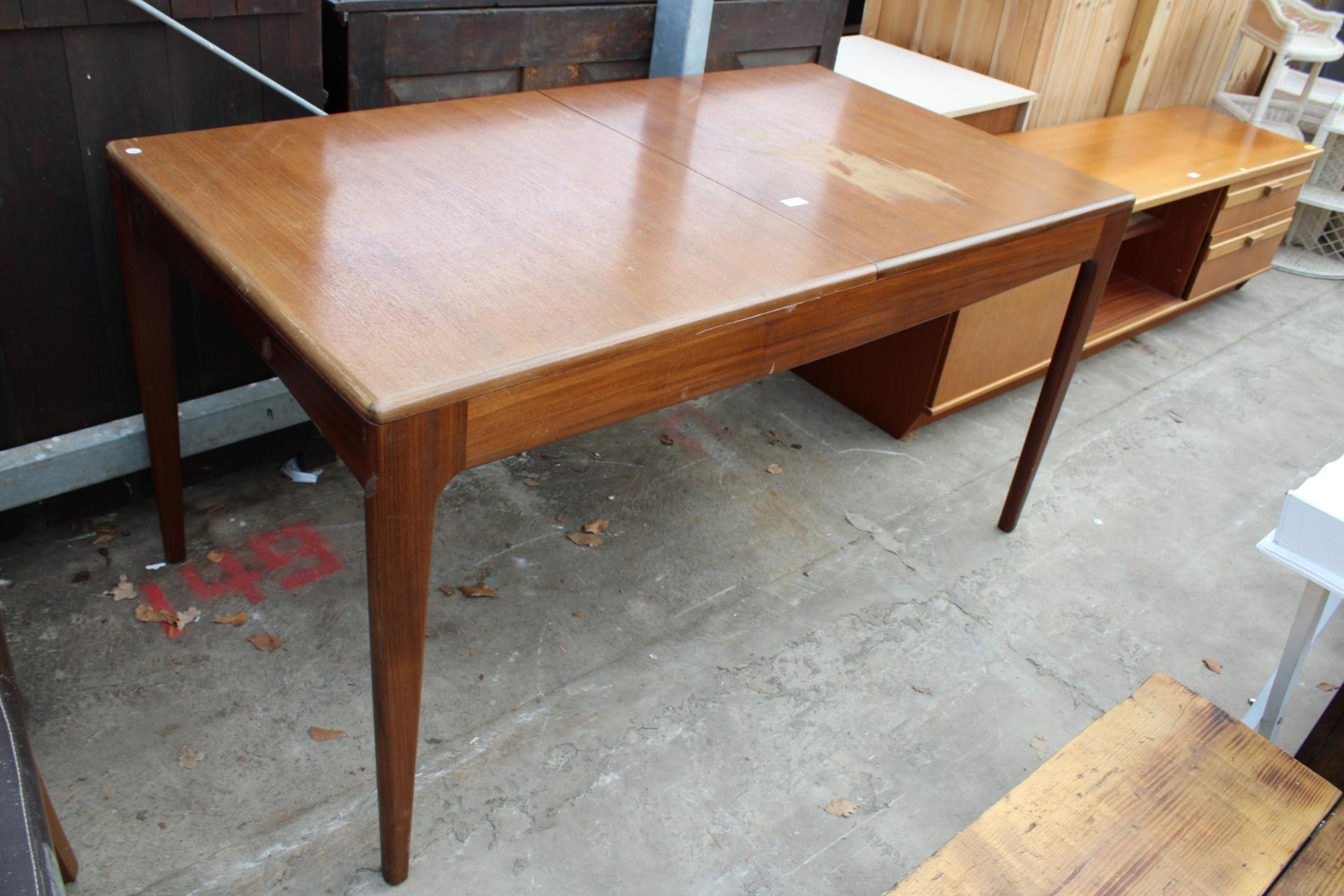 A RETRO TEAK EXTENDING DINING TABLE 56" X 31" (LEAF 22")