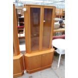 A RETRO TEAK TURNIDGE OF LONDON CORNER UNIT 35" SIDE WITH GLAZED UPPER PORTION