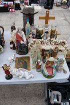 AN ASSORTMENT OF RELIGIOUS ITEMS TO INCLUDE FIGURES AND CANDLES ETC