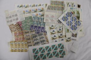 A COLLECTION OF BLOCKS OF STAMPS