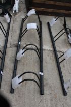 A METAL FOUR SECTION BIKE RACK