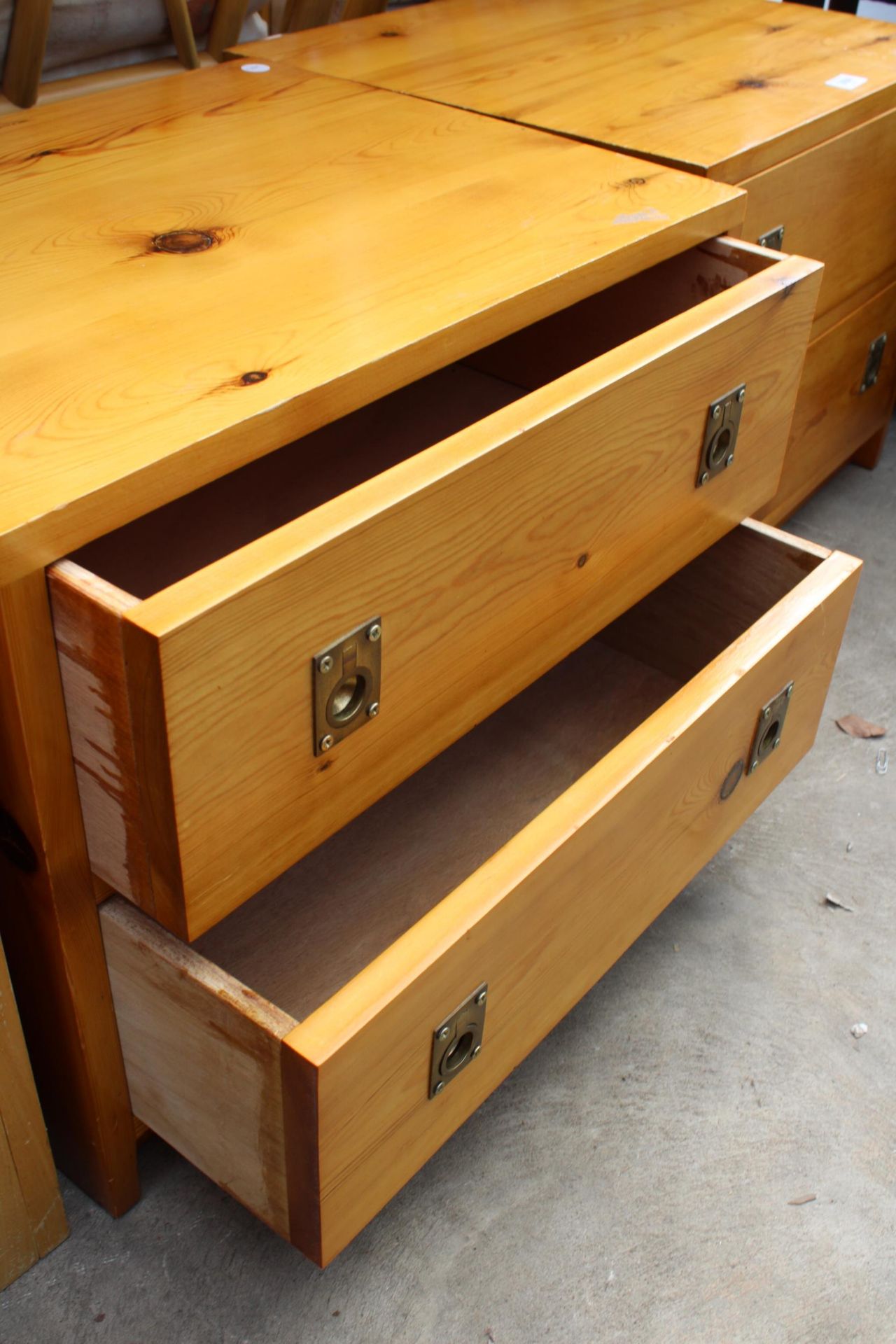 A PAIR OF MODERN PINE TWO DRAWER CHESTS WITH BRASS HANDLES - Image 2 of 2