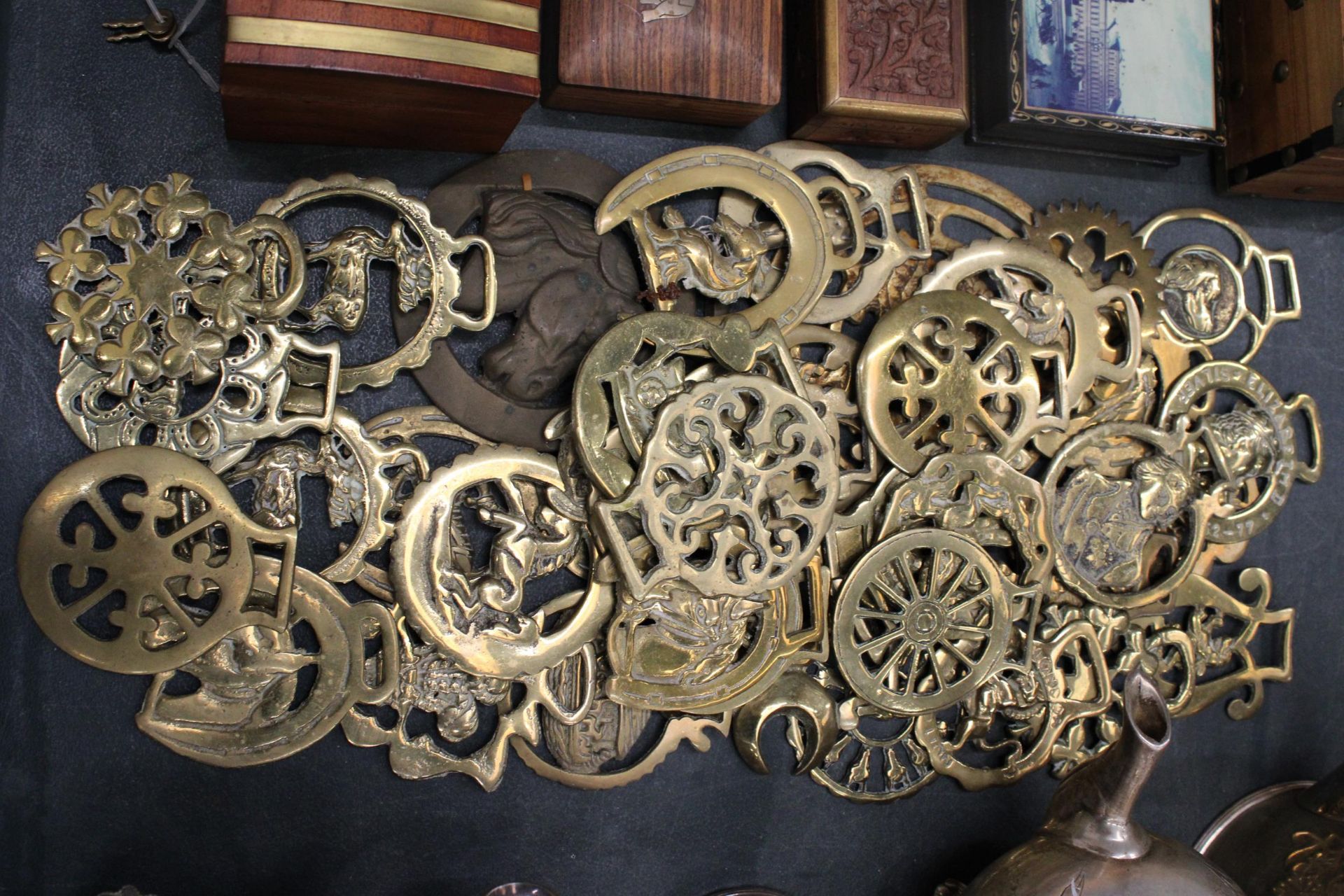 A LARGE COLLECTIONOF HORSE BRASSES