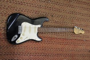 AN ENCORE BLACK STRATOCASTER ELECTRIC GUITAR