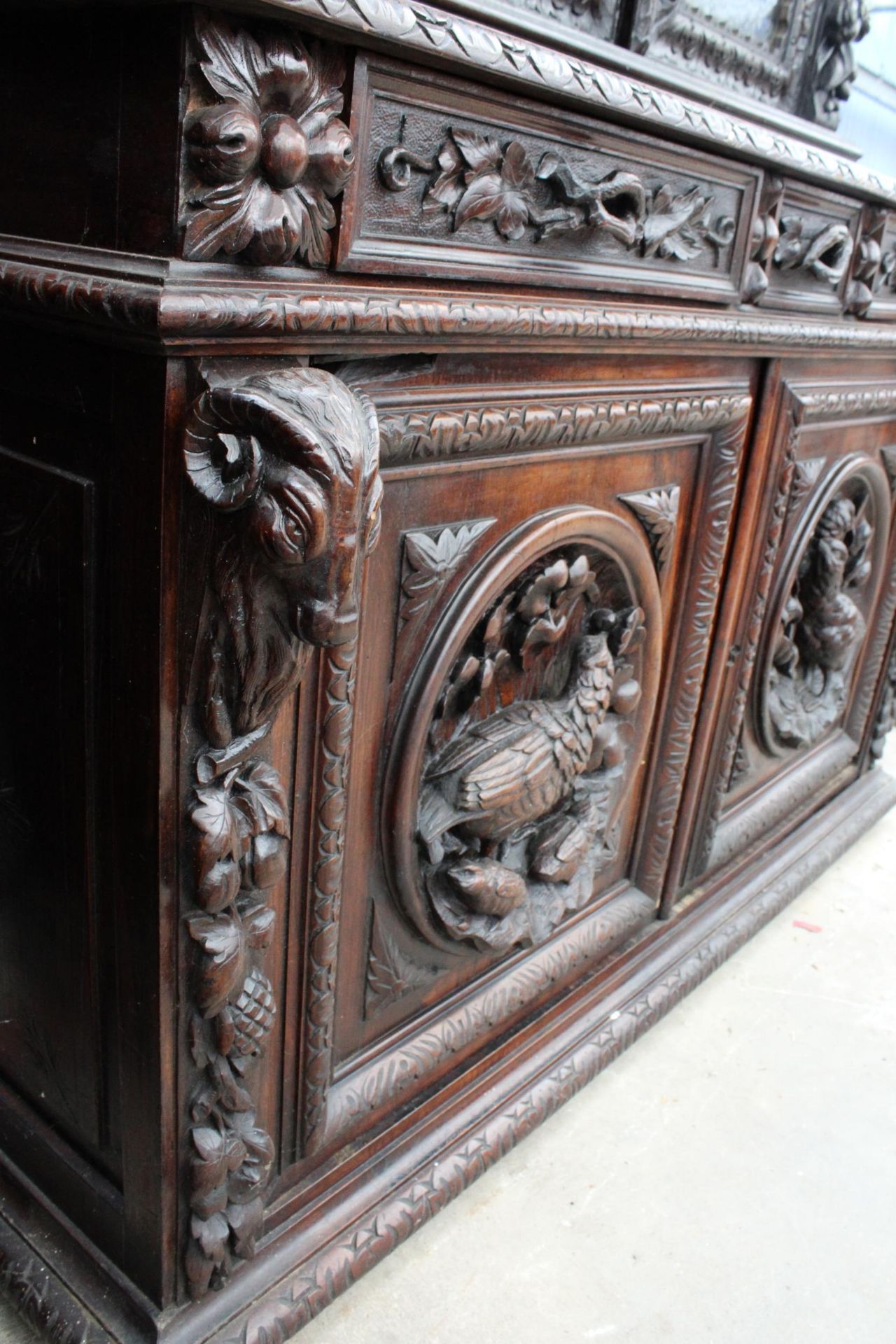 A VICTORIAN OAK BLACK FOREST STYLE SIDEBOARD WITH ASSOCIATED 2 DOOR GLAZED BOOKCASE, ALL HEAVILY - Image 11 of 12