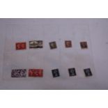 A COLLECTION OF STAMPS TO INCLUDE THREE VICTORIAN PENNY REDS, THREE 5D BLUES ETC