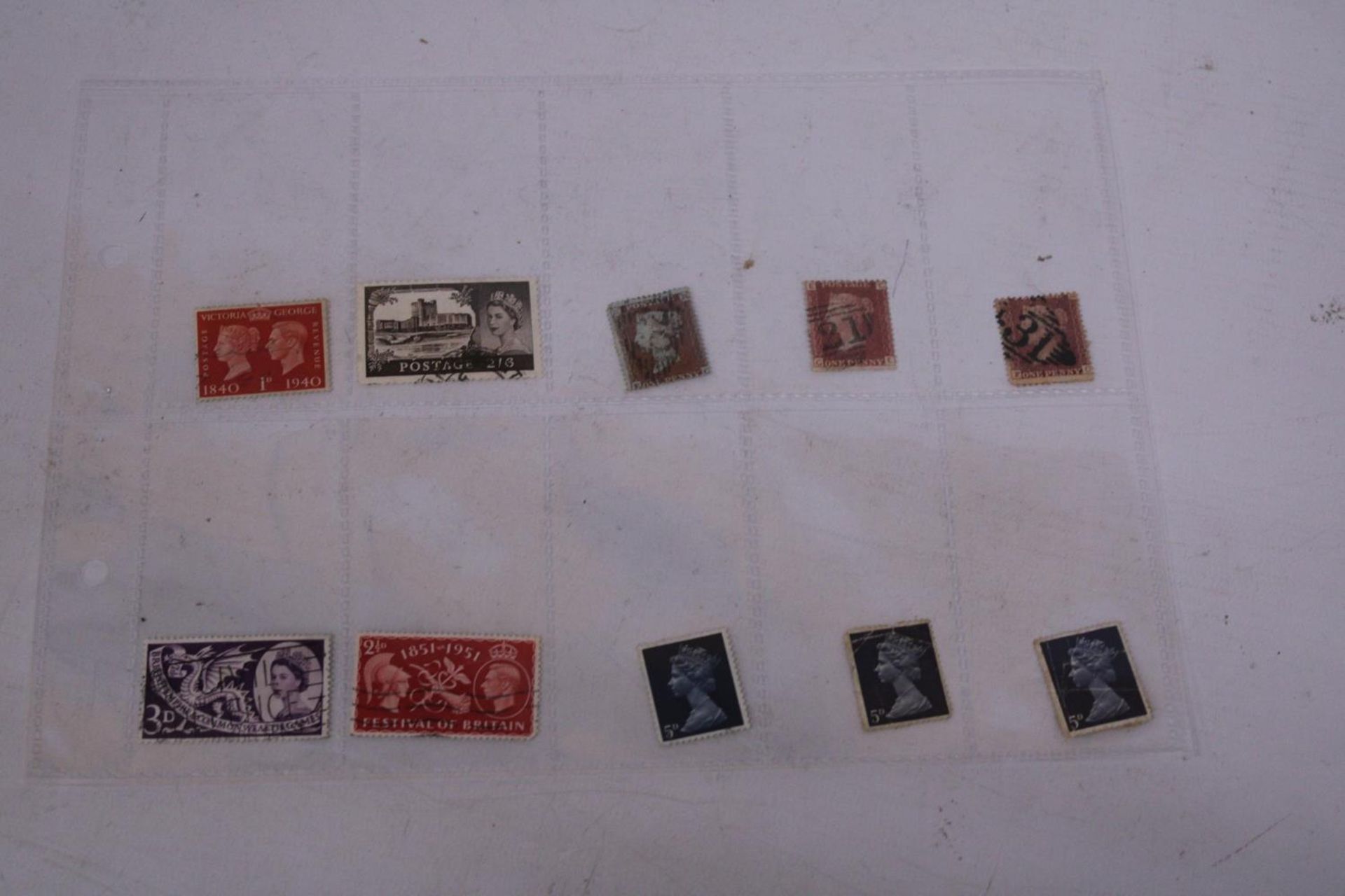 A COLLECTION OF STAMPS TO INCLUDE THREE VICTORIAN PENNY REDS, THREE 5D BLUES ETC