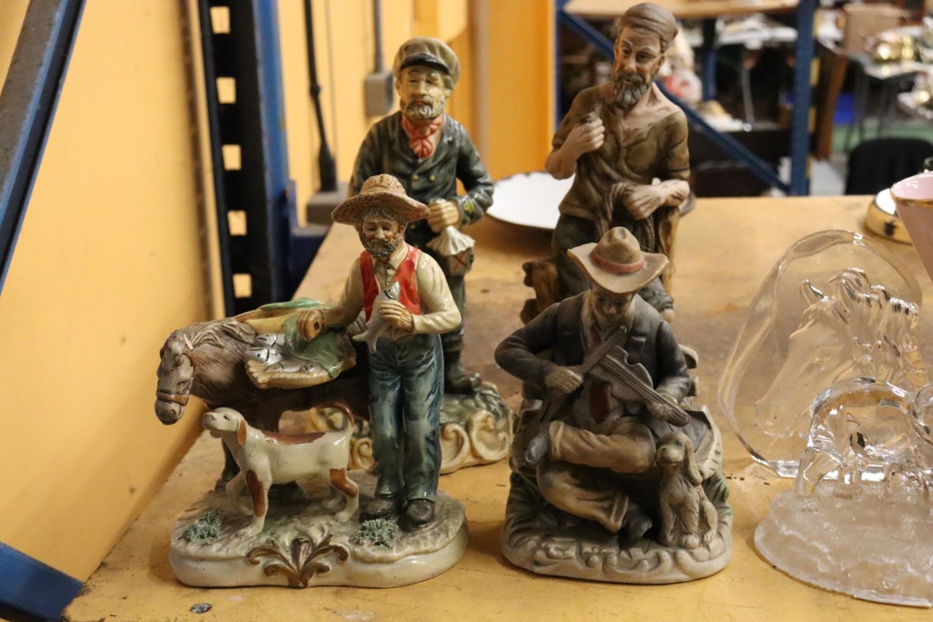 FOUR VINTAGE CHALKWARE FIGURES OF OLD MEN