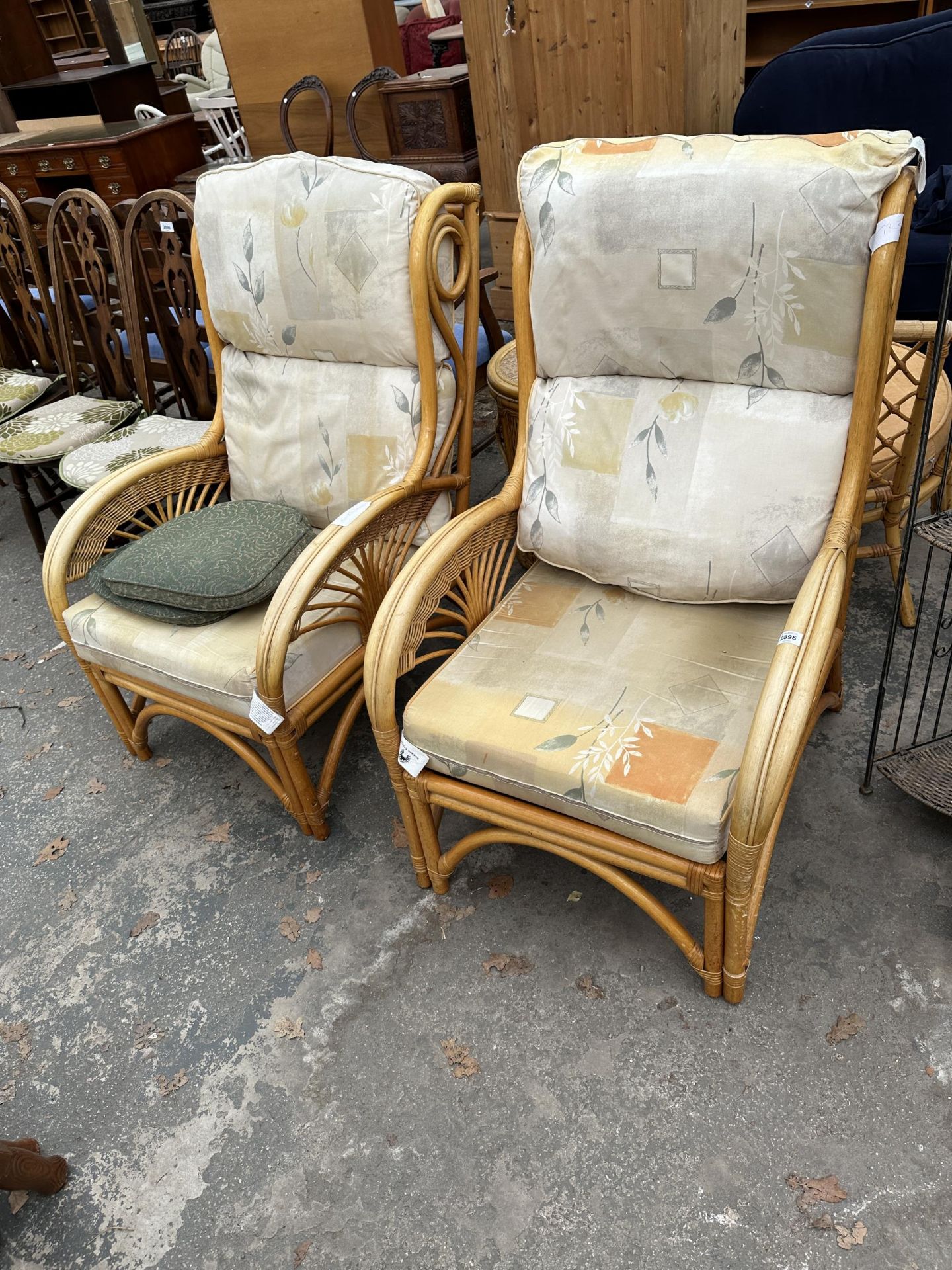 A PAIR OF BAMBOO AND WICKER EASY CHAIRS