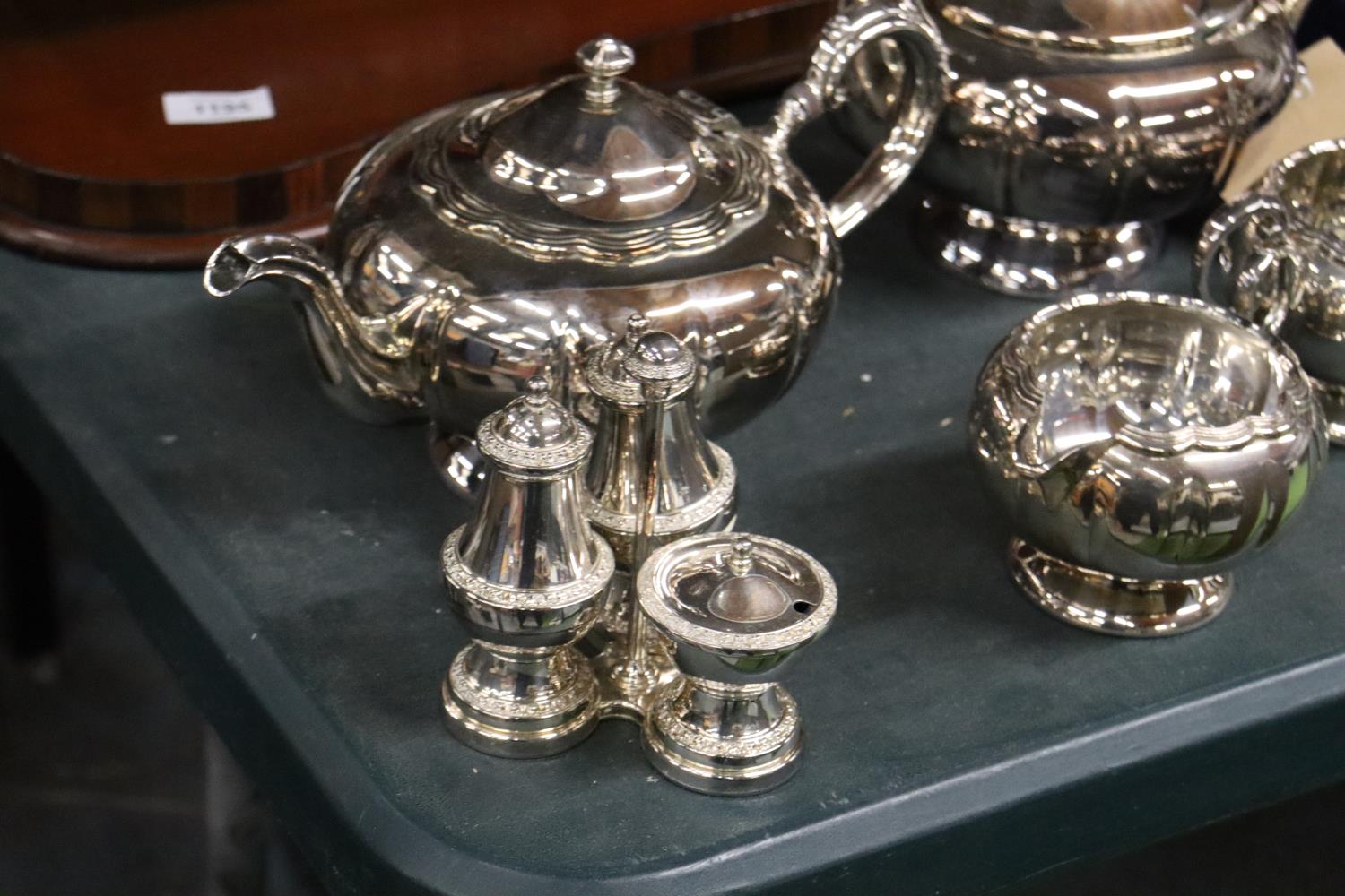 A SILVER PLATED TEASET TO INCLUDE A TEAPOT, COFFEE POT, SUGAR BOWL, CREAM JUG AND A CRUET SET - Image 2 of 5