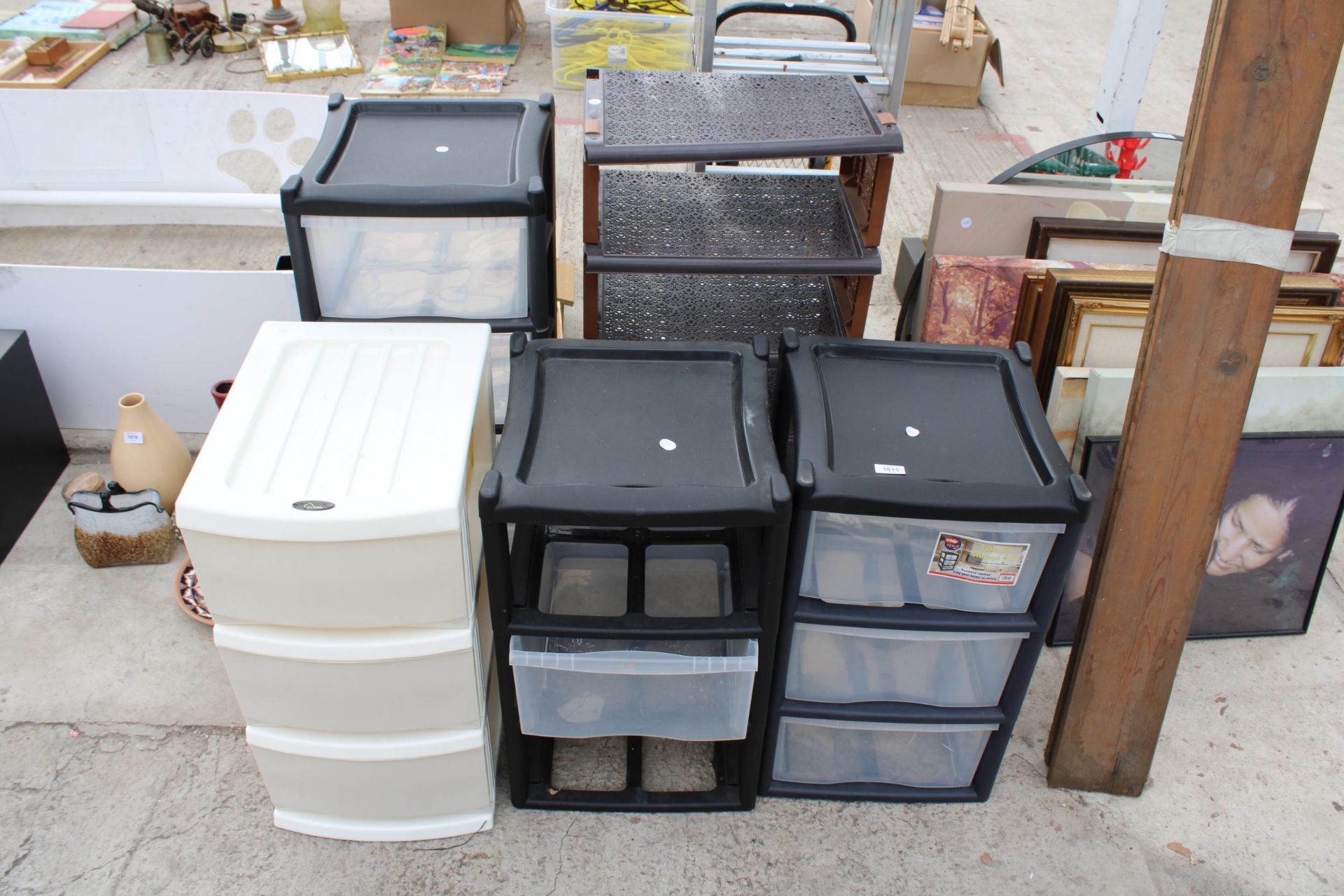 AN ASSORTMENT OF PLASTIC STORAGE DRAWERS AND SHELVES ETC