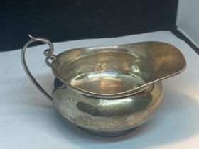 A HALLMARKED BIRMINGHAM SILVER SAUCE BOAT